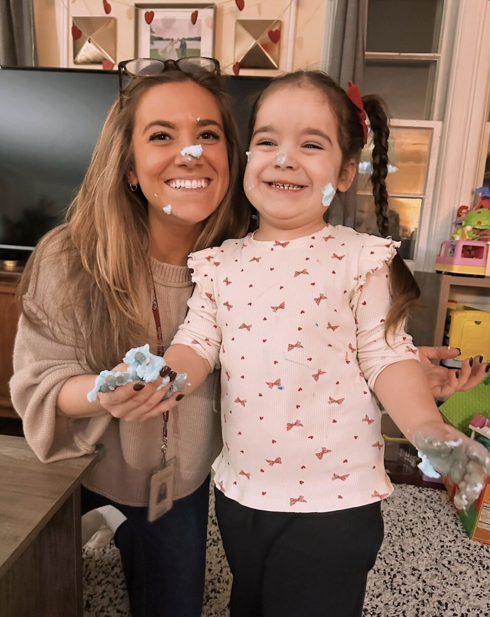 Therapist and child playing with foam